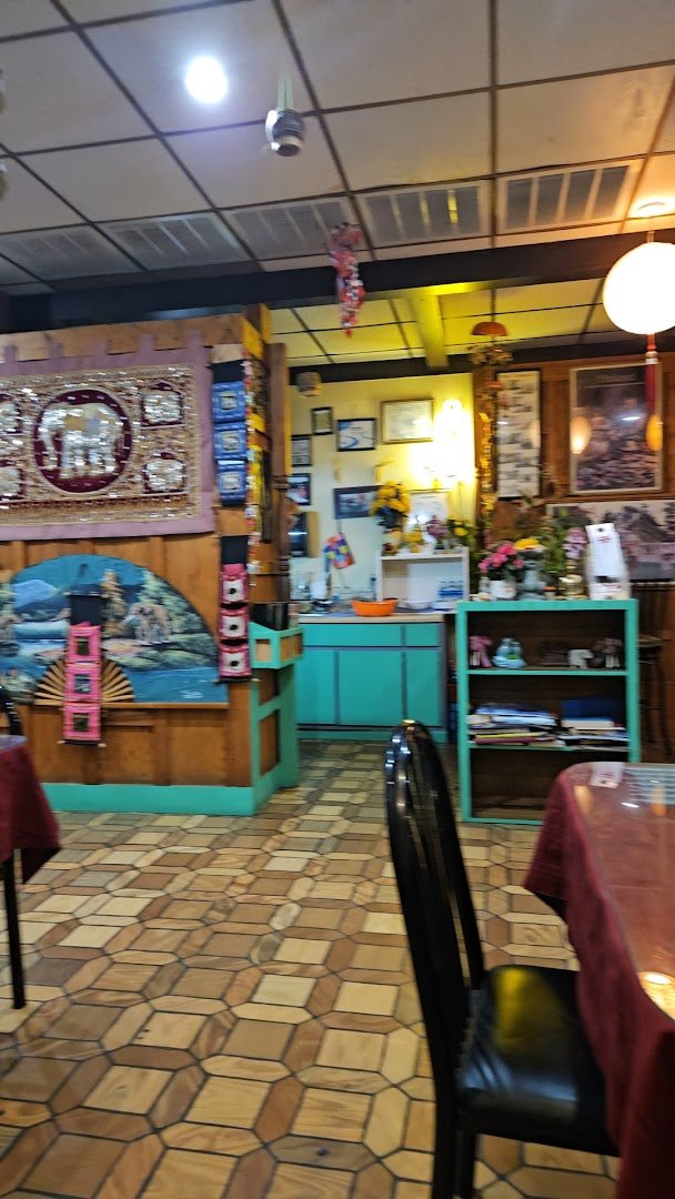 Table service area with chairs and clean tables.