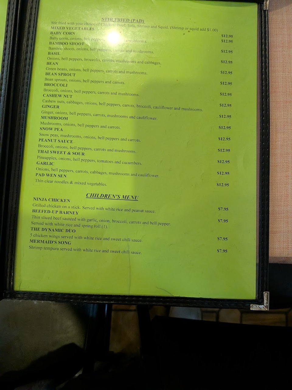 Menu page with red curry and basil dishes.
